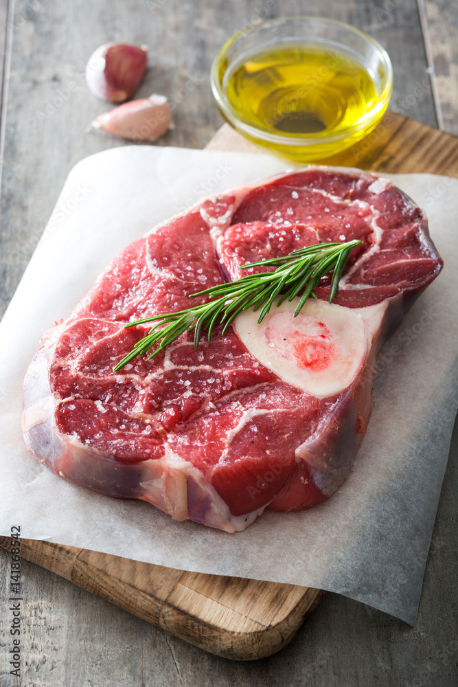 Raw meat on wooden background
Raw meat on wooden background