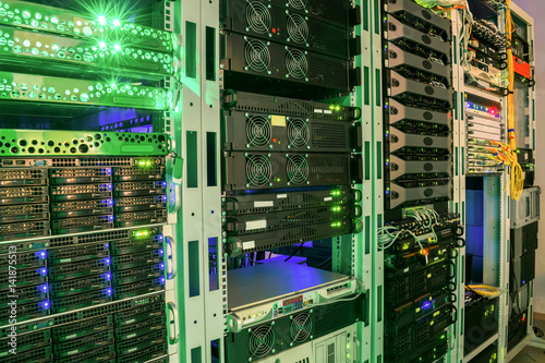 Canvastavla Many racks with servers located in the server room