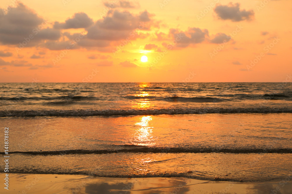 Sunset on the beach. Koh Chang island, Thailand. Romantic feeling. Golden sun and sky.