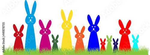 12 bunte Osterhasen im Gras