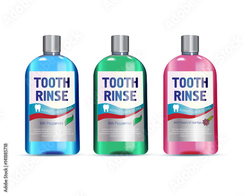 Mouth rinse in different colors of bottles.