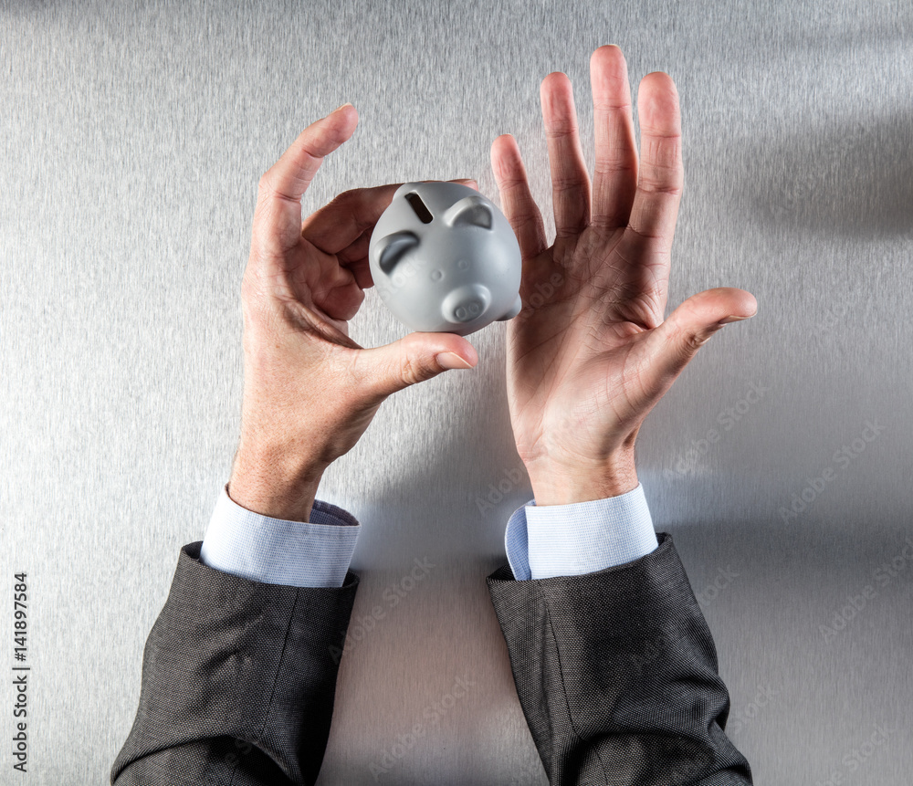 Fototapeta premium questioning businessman hands showing a money box for banking concept