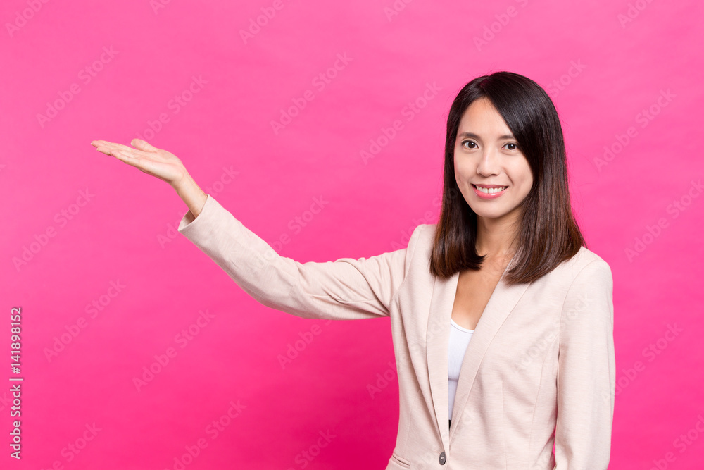 Businesswoman showing open palm