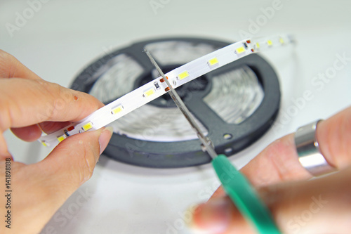 Cut the led strip by scissors photo