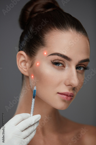 Beautiful Woman Receiving Facial Skin Lift Injections