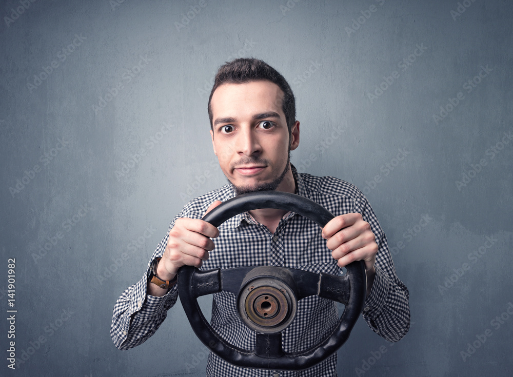 © ra2 studio - Man holding steering wheel © ra2 studio - Man holding steering wheel