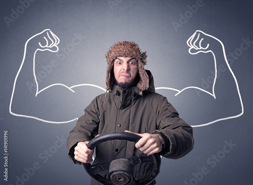 Man holding steering wheel