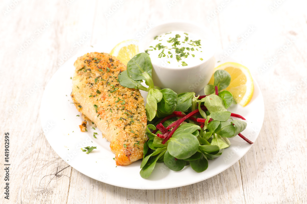 fried chicken fillet with salad and sauce fried chicken fillet with salad and sauce