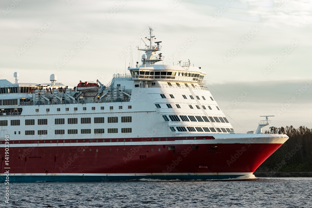 Red cruise liner's bow. Passenger ferry underway