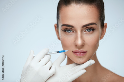 Beautiful Woman With Soft Skin Receiving Beauty Injection