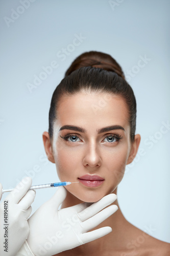 Beautiful Woman With Soft Skin Receiving Beauty Injection