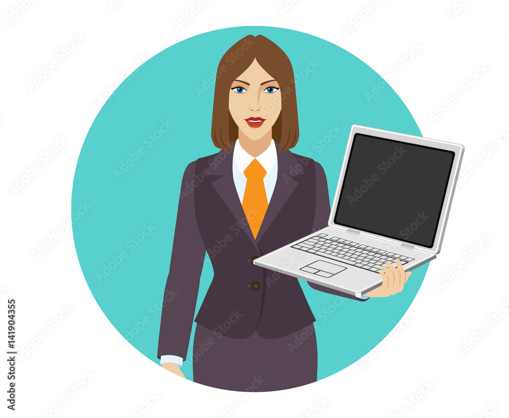 Businesswoman holding a laptop notebook PC Businesswoman holding a laptop notebook PC