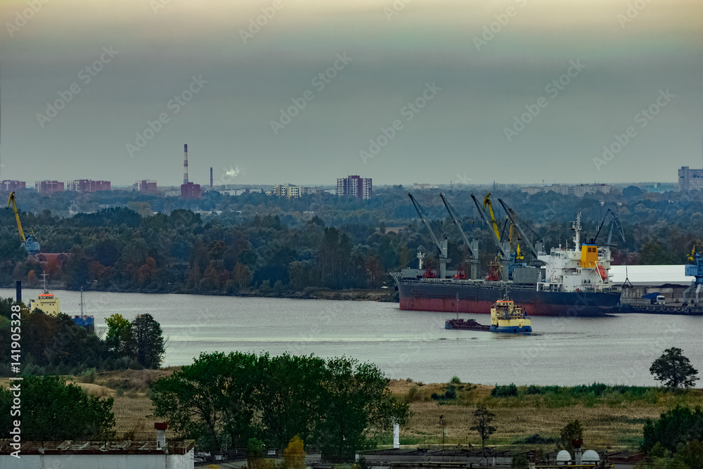 Cargo ship (bulk carrier) loading in port at Riga, Latvia