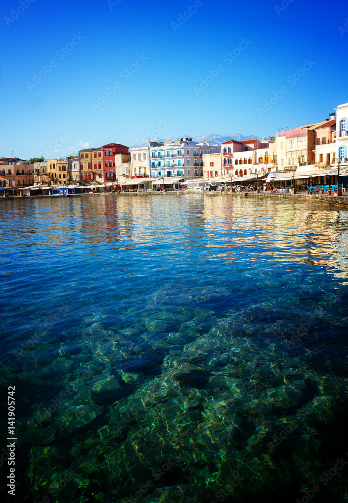clear turqiouse water of Chania habour, Crete, Greece, retro toned