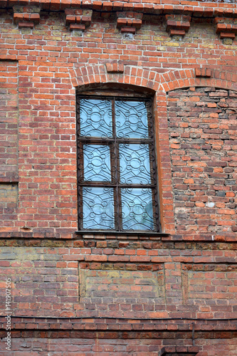 Old window with lattices on a brick wall, architecture, vintage, texture, background