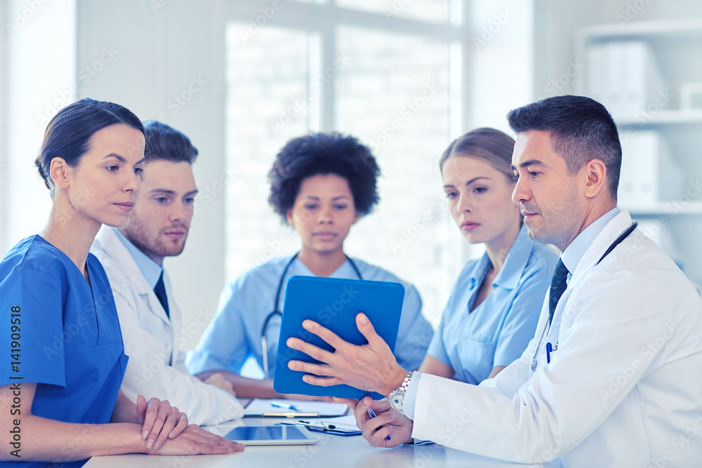 group of happy doctors meeting at hospital office group of happy doctors meeting at hospital office