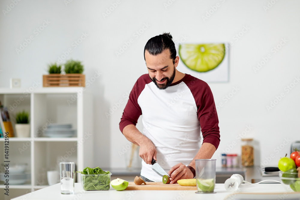 man with blender and fruit cooking at home kitchen man with blender and fruit cooking at home kitchen