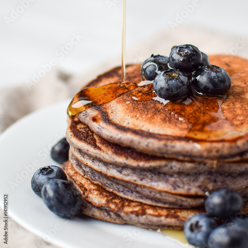 Wallpaper Mural syrup is poured on top of lemon poppy seed pancakes with blueberries  Torontodigital.ca