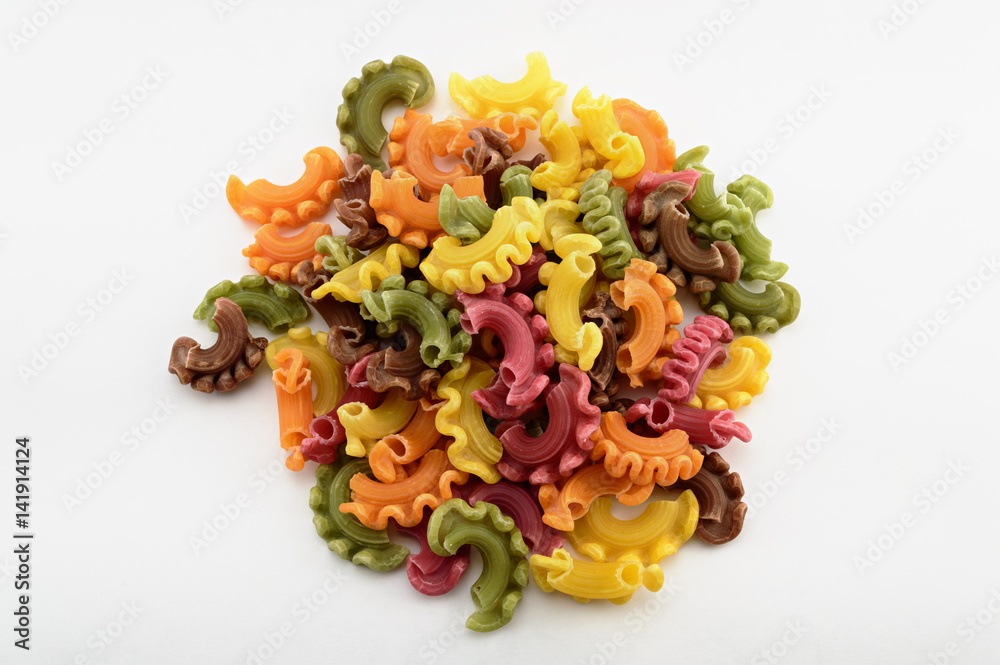 Dry italian pasta in five colours on white Dry italian pasta in five colours on white