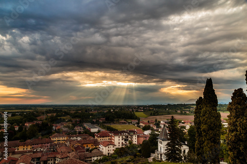 Evening storm over the medieval village