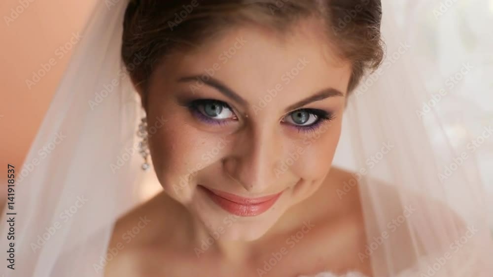 Close up portrait of bride with beautiful bridal veil before wedding ceremony Close up portrait of bride with beautiful bridal veil before wedding ceremony