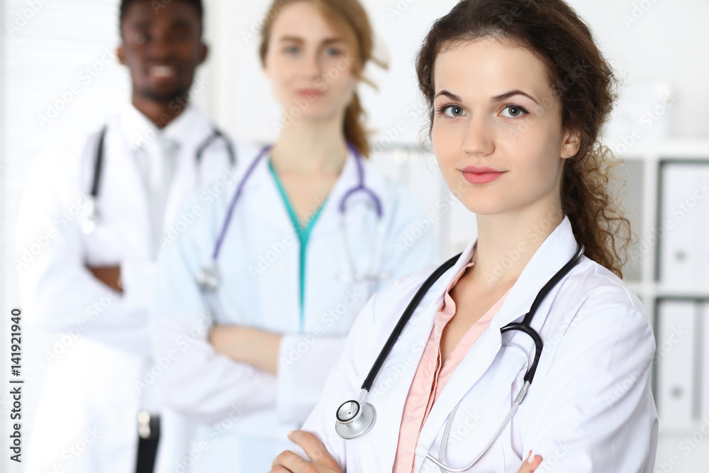 Medical team of confident doctors ready to help. Medicine and health care, insurance concept Medical team of confident doctors ready to help. Medicine and health care, insurance concept
