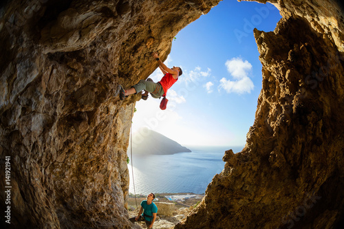 Rock climbers in cave