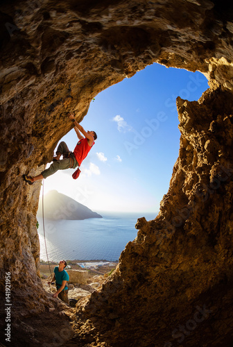 Rock climbers in cave