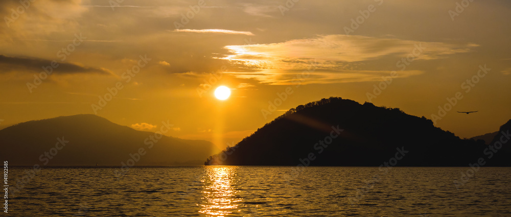Beautiful and colorful sunset on Lake Iseo in Italy letterbox
