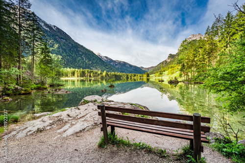 Small bench at the Hitersee lake in the Alps, Europe