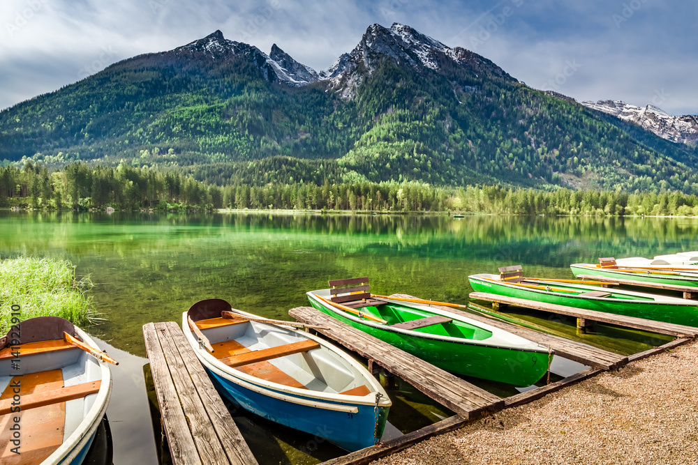 Few boats on the lake Hintersee in German Alps, Europe