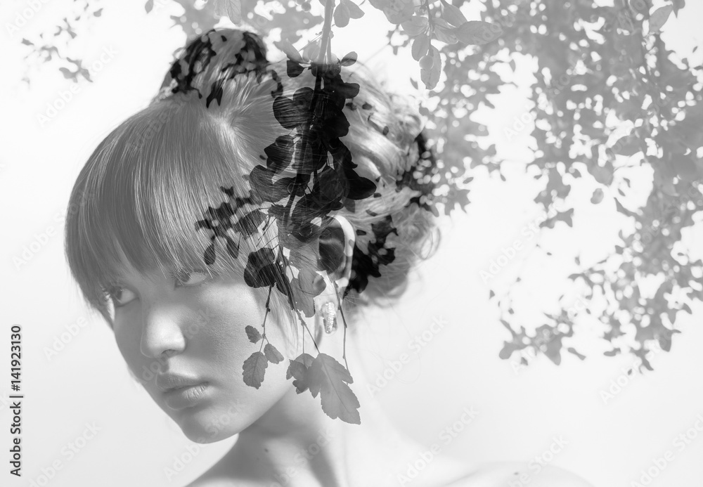 Fototapeta premium Monochrome double exposure of beautiful bride and leaves