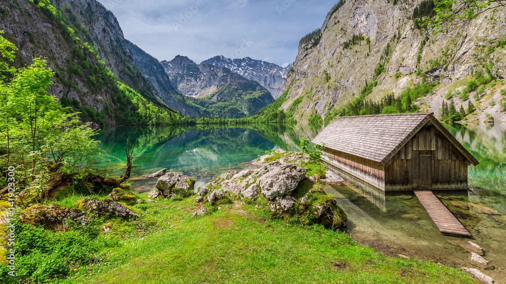 Little hut at the lake Obersee in Alps, Europe