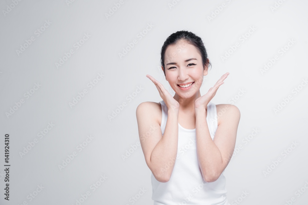 Happy asian young woman beautiful smile with think gesture posture isolated on white background Happy asian young woman beautiful smile with think gesture posture isolated on white background
