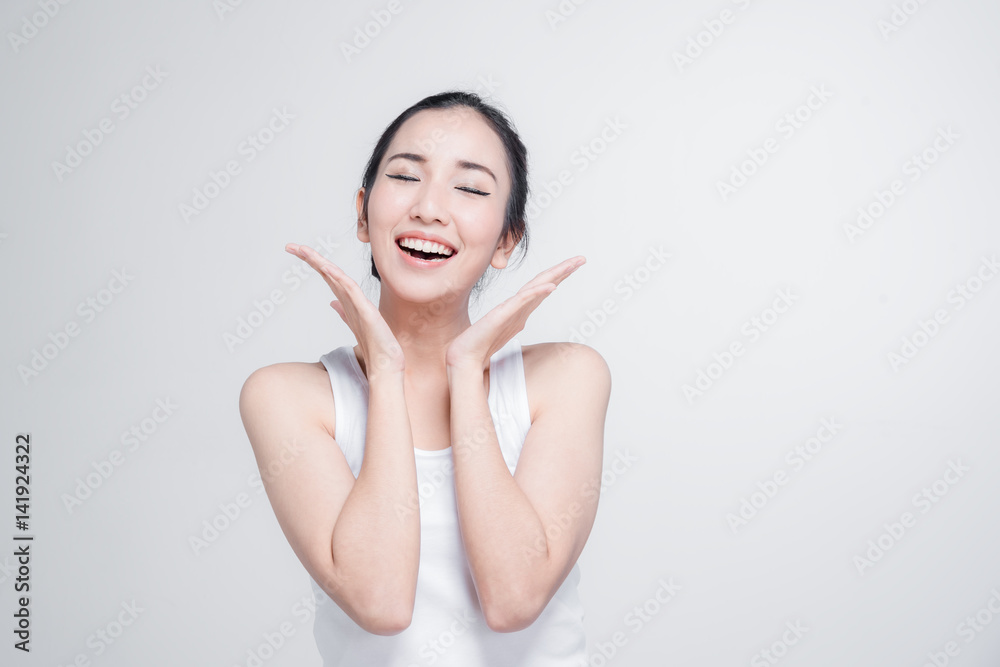 Happy asian young woman beautiful smile with think gesture posture isolated on white background Happy asian young woman beautiful smile with think gesture posture isolated on white background