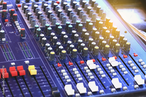 Mixer level control knob in the control room and sound recorder.