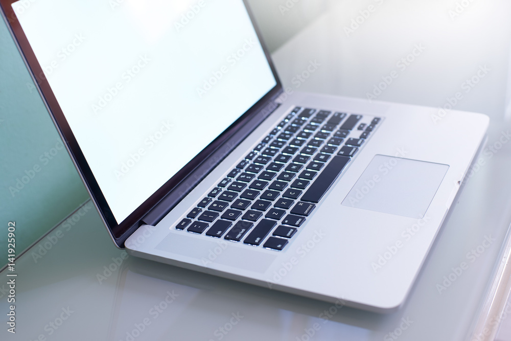 Laptop with white copy space screen .close up seleted focus on keyboard . Laptop with white copy space screen .close up seleted focus on keyboard .