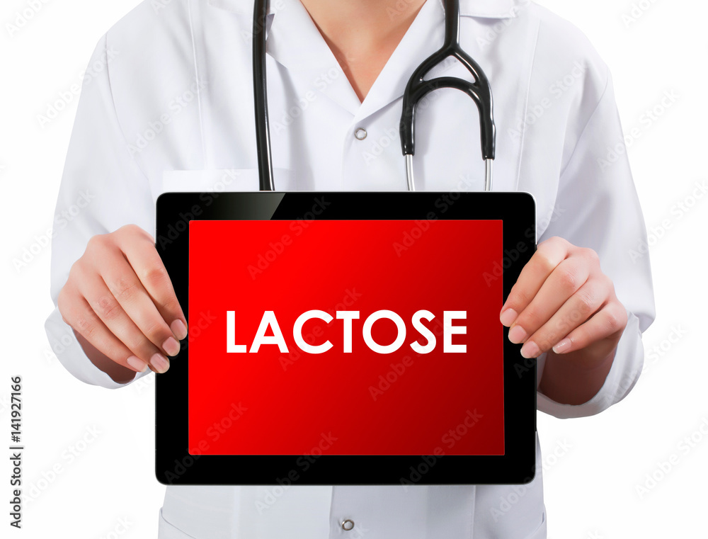Doctor showing digital tablet screen.Lactose Doctor showing digital tablet screen.Lactose