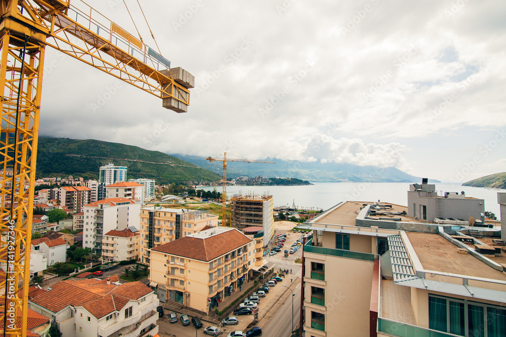 Budva building construction. Construction crane high-rise building in the center of Budva, Montenegro