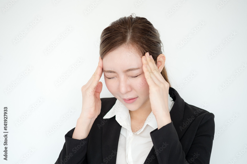 Young asian business woman headache white background. work hard tired concept. Young asian business woman headache white background. work hard tired concept.