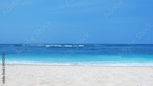 Beach background /A beach is a landform along a body of water. It usually consists of loose particles, which are often composed of rock, such as sand, gravel, shingle, pebbles © taffpixture