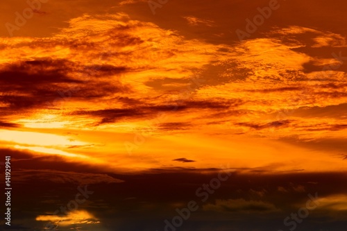 sky red in sunset and  cloud, beautiful colorful evening nature space for add text © pramot48