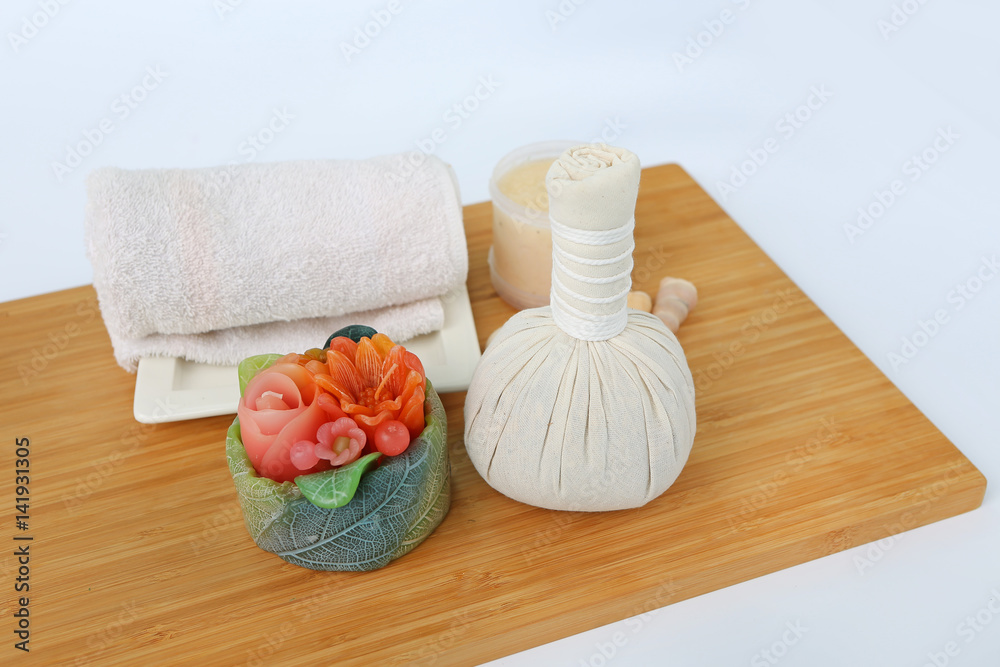 Spa herbal compressing ball with towels and Salt Scrub, Spa concept background Spa herbal compressing ball with towels and Salt Scrub, Spa concept background