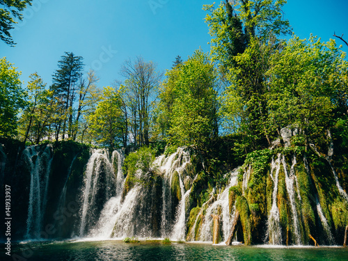 Waterfall in the national park Plitvice Lakes  Croatia. Waterfall in the forest.