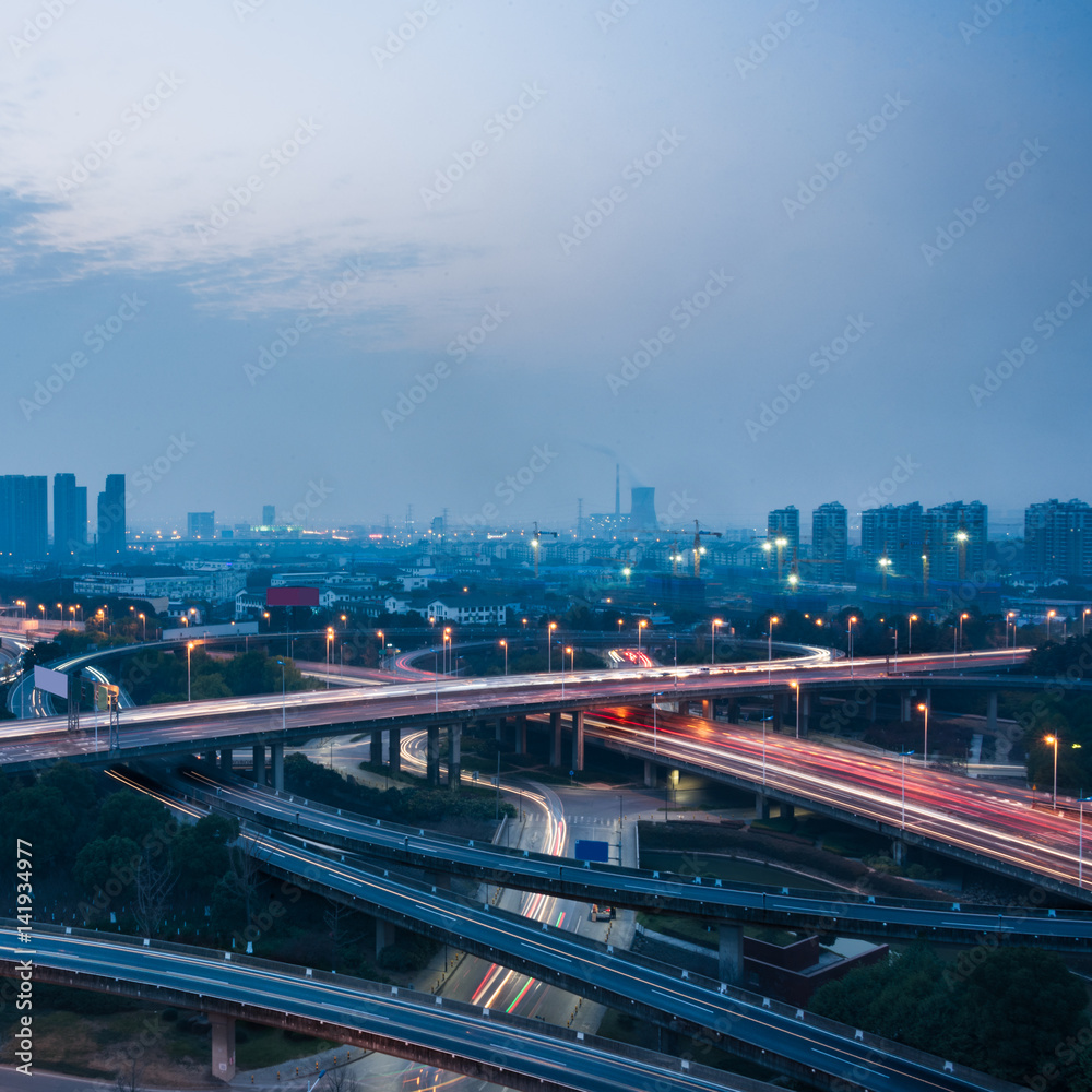 Naklejka premium urban traffic with cityscape in city of China.