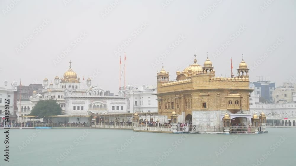 Golden temple in Amritsar, with water in front. Golden temple in Amritsar, with water in front.