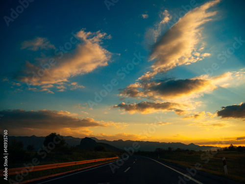 The road at sunset. View from the car. Highways in Croatia. © Nadtochiy