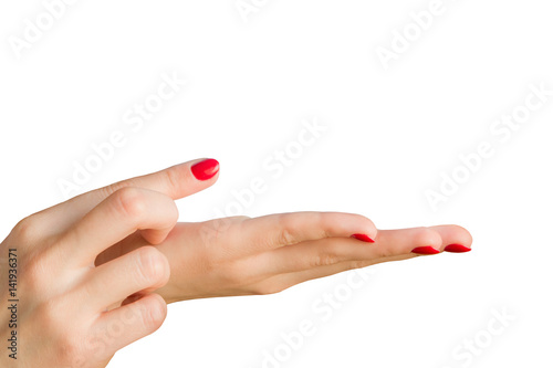 Beautiful hands of young woman on white background. The finger points to the object.