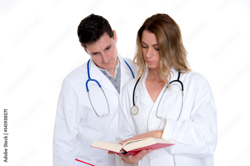 young friendly medical team with book in lab coat young friendly medical team with book in lab coat