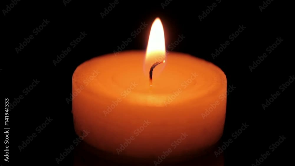 Isolated candle on the mirror table. Close up shot Isolated candle on the mirror table. Close up shot